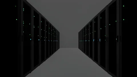 A server room with rows of black racks and blinking status lights