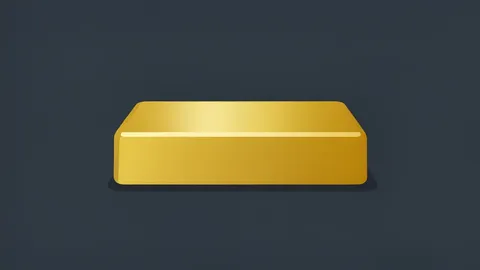 A polished gold bar resting on a dark surface