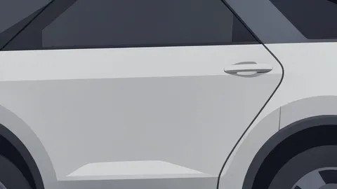 A modern electric SUV parked on a smooth concrete surface