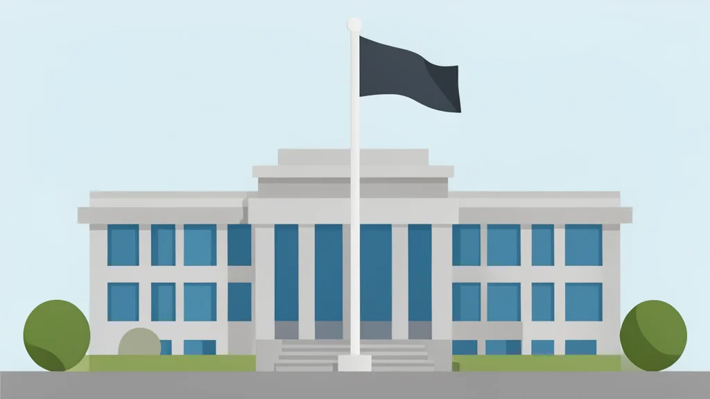 A modern government building with a large flagpole in front