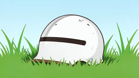 A football helmet resting on a grassy field