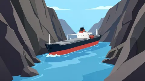 A large oil tanker navigating a narrow rocky strait