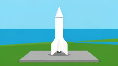 A rocket standing vertically on a concrete launch pad surrounded by coastal marshland