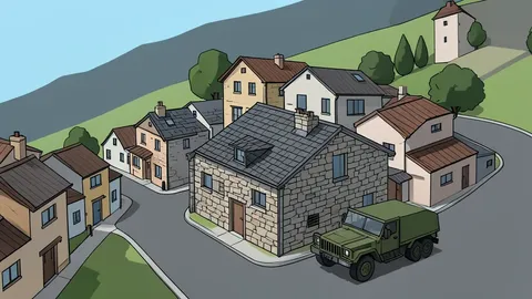 A cluster of stone houses in a hillside town with narrow streets and a military vehicle parked on the road
