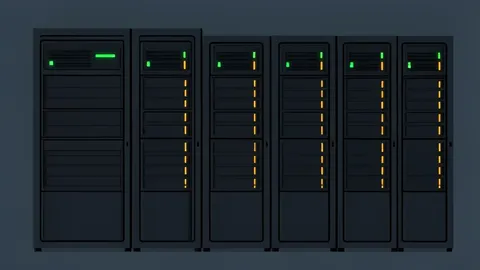 A row of industrial server racks with blinking status lights in a dark data center
