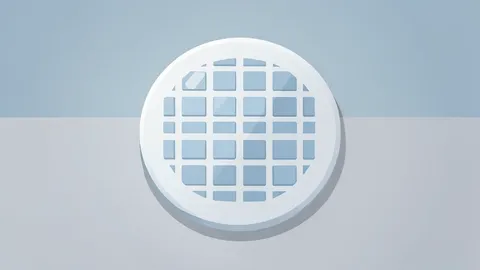 A silicon wafer resting on a cleanroom surface