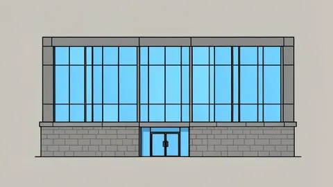 A modern government ministry building facade with large glass windows and a stone base.
