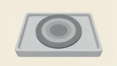 A silicon wafer resting on a cleanroom tray