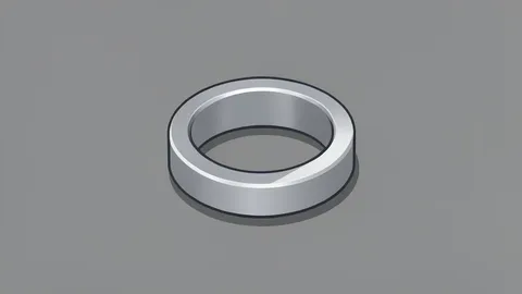A sleek, metallic smart ring resting on a matte surface