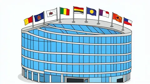 A modern institutional building with a glass curtain wall and a flagpole