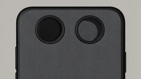 A smartphone with a fabric-textured back and dual speaker grilles on the top frame