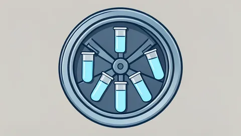 A laboratory centrifuge spinning test tubes containing clear liquid