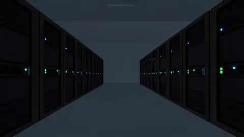 Rows of black server racks with blinking status lights in a dimly lit room
