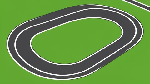 A paved oval racetrack with white boundary lines and a grassy infield