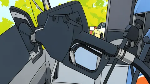 A fuel pump nozzle dispensing liquid into a vehicle tank