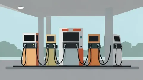 A row of fuel pumps at a gas station