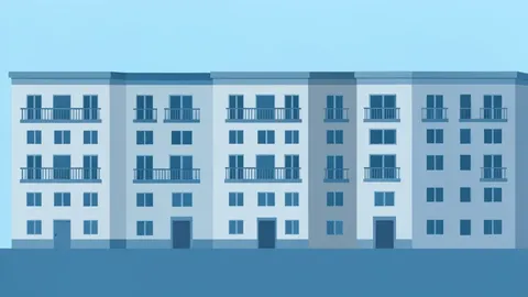 A row of multi-story residential apartment buildings with balconies