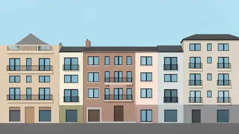 A row of multi-story apartment buildings with balconies and windows