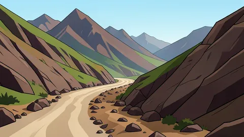 A rugged mountain pass along a border region with dusty roads and rocky terrain
