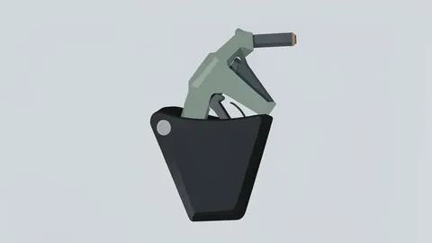 A close-up view of a fuel pump nozzle resting securely in its holster at a gas station.