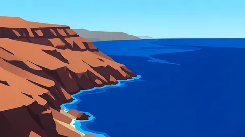 A rugged coastline meeting the deep blue waters of the Red Sea