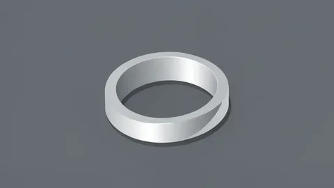 A sleek, metallic smart ring resting on a matte surface