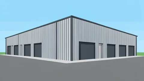 A large, modern industrial warehouse with a corrugated metal exterior and loading docks