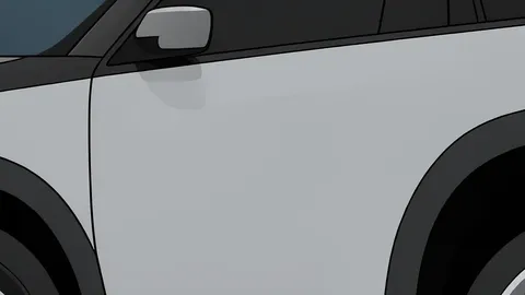 A large electric SUV parked next to a charging station