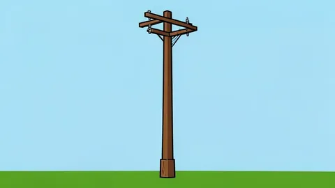 A stack of wooden utility poles standing in a forest clearing