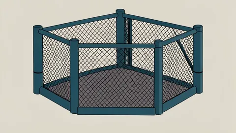 An octagonal fighting cage with padded posts and chain-link fencing