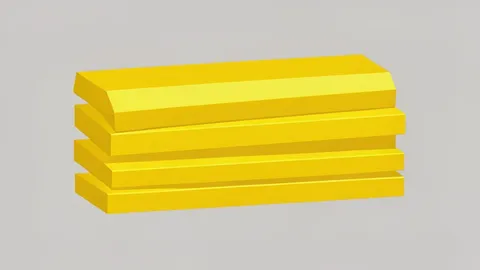 A stack of shiny, yellow metal bars