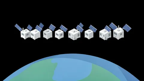 A row of small, boxy satellites with solar panels deployed, floating in the blackness of space above the curve of the Earth.