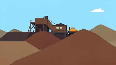 A large industrial mining facility with heavy machinery and piles of raw mineral ore