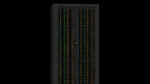 Rows of black server racks with blinking status lights in a dimly lit data center aisle