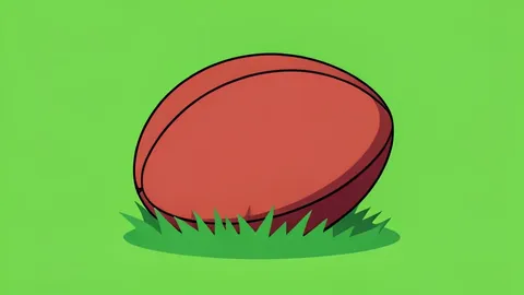 A rugby ball resting on green grass