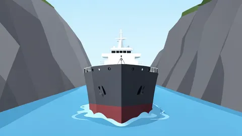 A crude oil tanker ship moving through a narrow strait