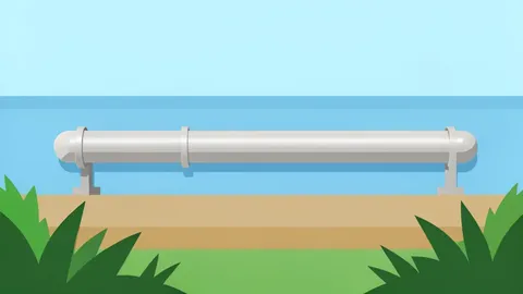 A long, silver metallic pipeline running through a coastal landscape
