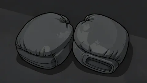 A padded octagonal fighting cage with chain-link fencing
