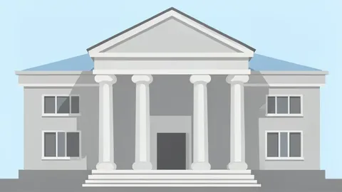 A classical government building facade with columns and a pediment