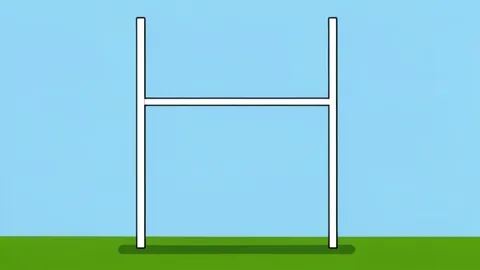 A green grass football field with white yard lines and goalposts in the distance
