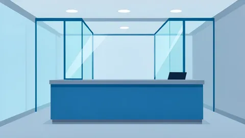 A modern bank branch interior featuring a service counter and glass partitions.