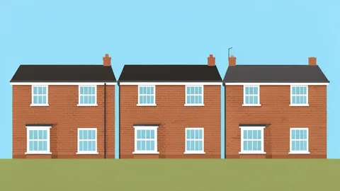 A row of terraced houses with brick facades and sash windows