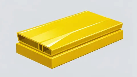 A stack of shiny, yellow metal bars