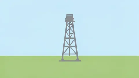 A solitary oil derrick standing in a flat grassy field