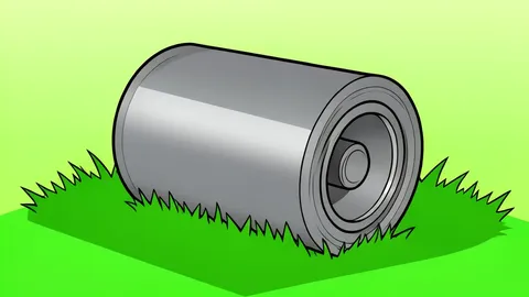 A heavy cylindrical metal pitch roller resting on green grass