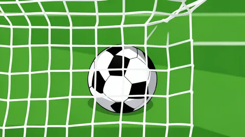 A soccer ball resting on the grass of a stadium pitch