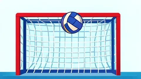A handball in mid-air near a net, capturing the moment of a goal.