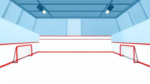 A wide-angle view of an indoor ice hockey arena with a pristine white ice surface and two red goal nets positioned at opposite ends.