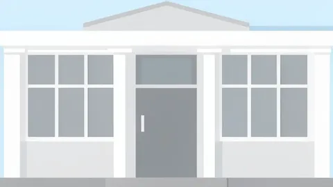 A modern government ministry building facade with clean lines and large windows.