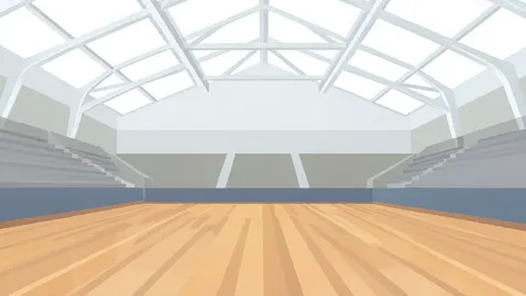 A wide-angle view of a modern indoor volleyball arena with a glossy wooden court and high white ceilings.